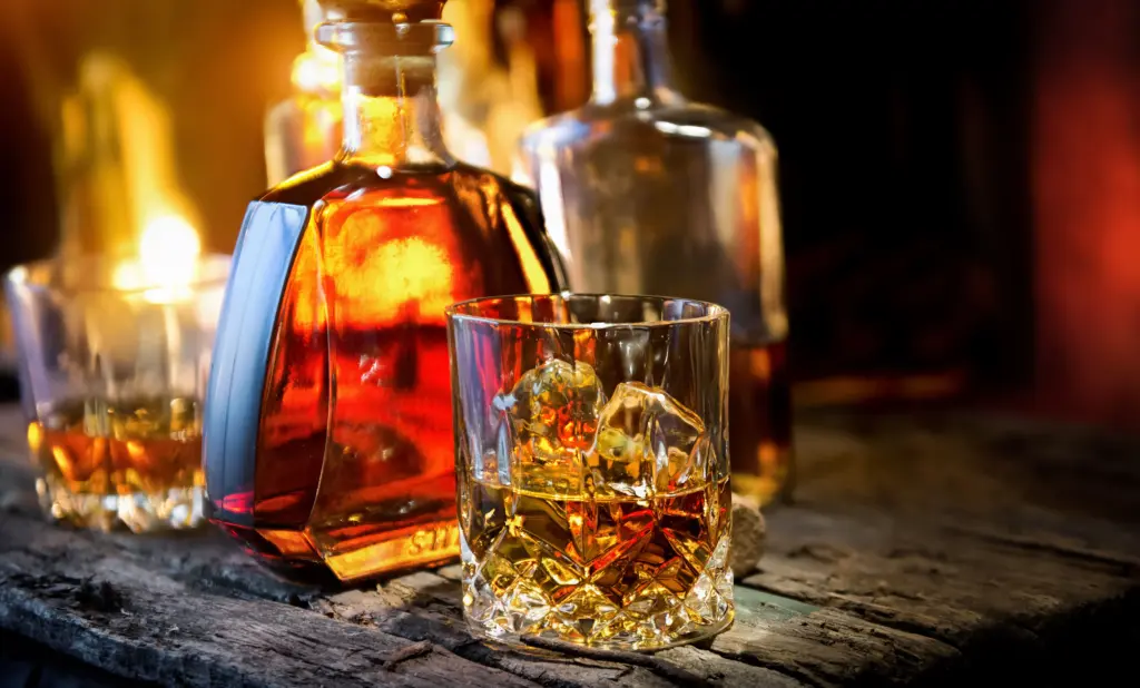 whiskey with ice on rustic wooden table 2026 03 20 00 59 54 utc (2)
