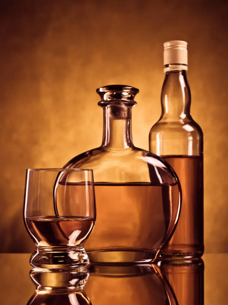 amber whiskey glassware and bottles in studio sett 2026 03 17 04 07 53 utc (1)