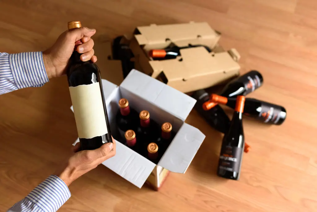 cardboard box with quality wine bottles sent by po 2026 01 05 06 22 18 utc